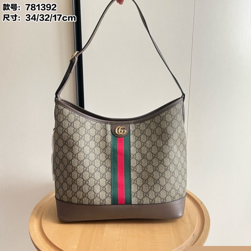 G*u*i top handle bags